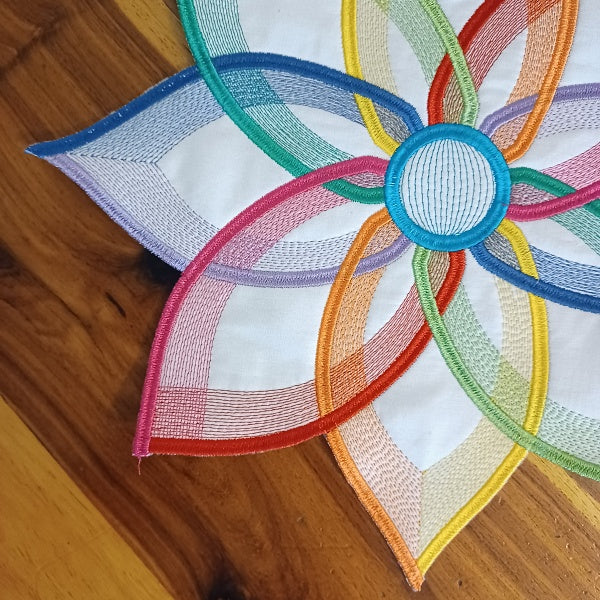 EW342 ITH Intertwined Petal Table Topper