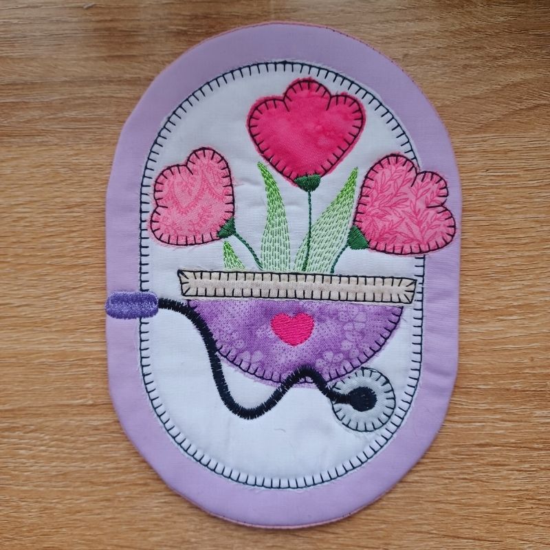 EW409 ITH Spring Mug Rugs