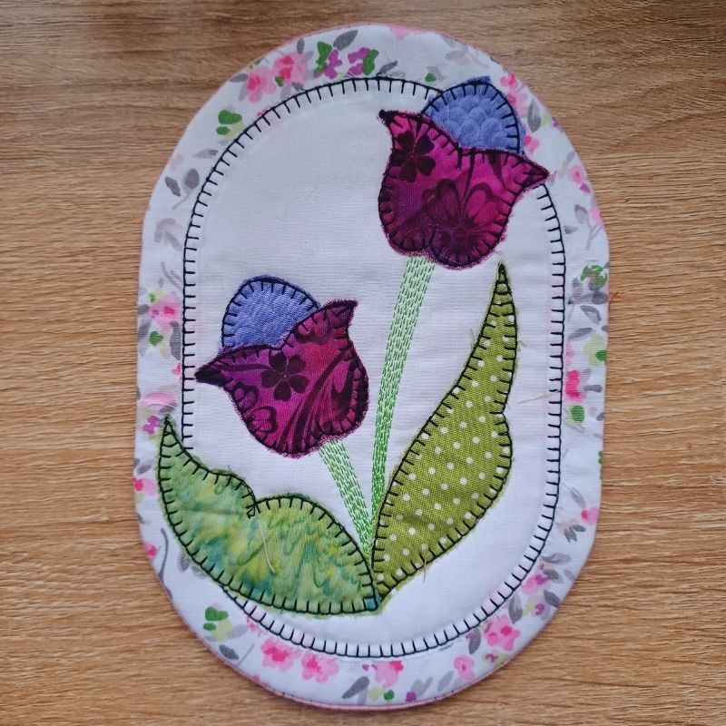 EW409 ITH Spring Mug Rugs