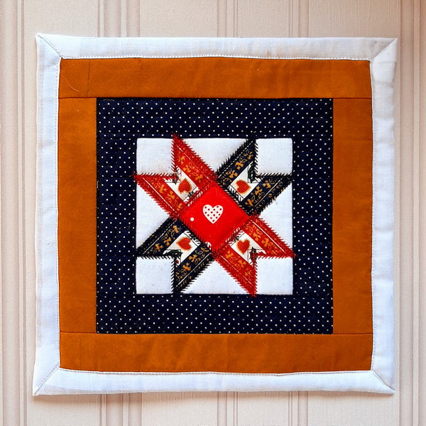 EWC208 ITH Quilted Star Potholders
