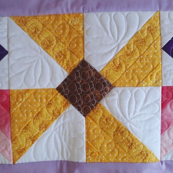 EWV228  Flutterby Quilted Table Topper