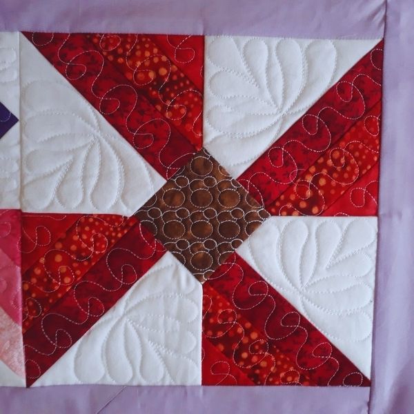 EWV228  Flutterby Quilted Table Topper