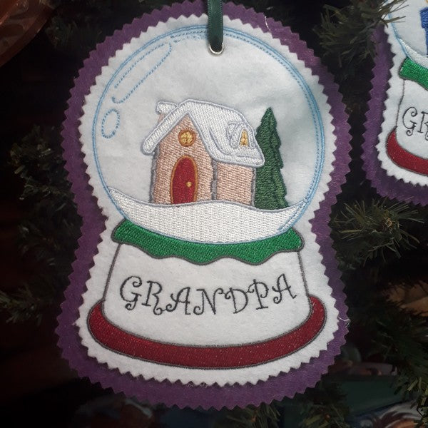 EWV293  Family Snow Globes