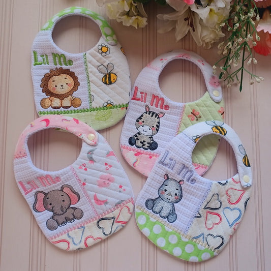 EW303  ITH Quilted Baby Animal Bibs