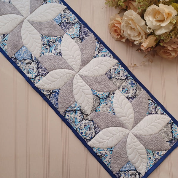 EW304  Drunkard’s Path Quilted Poinsettia Block Table Runner