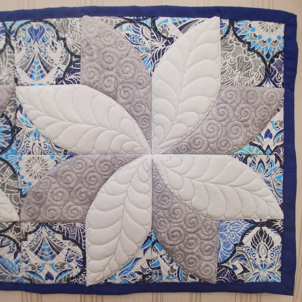EW304  Drunkard’s Path Quilted Poinsettia Block Table Runner