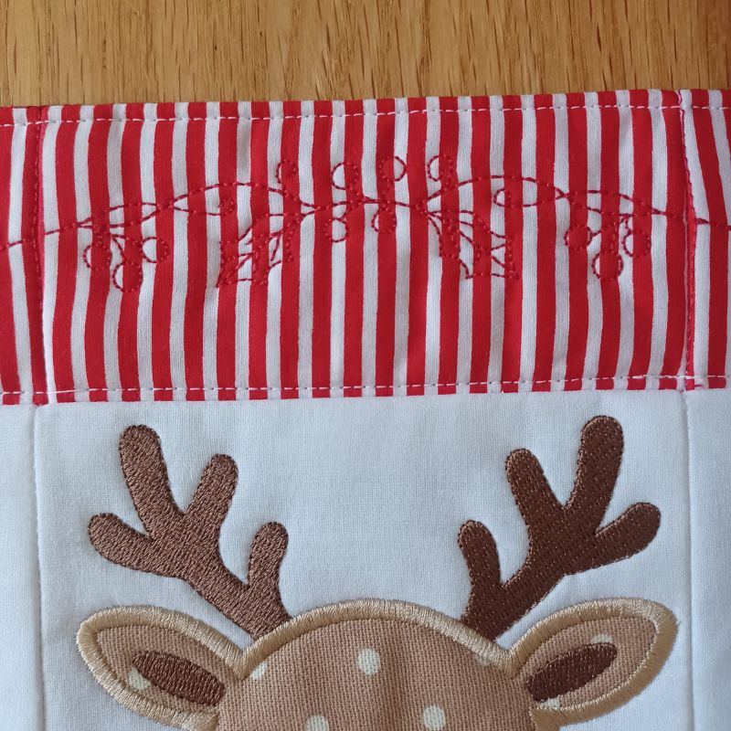 EW468 - ITH Reindeer Placemat