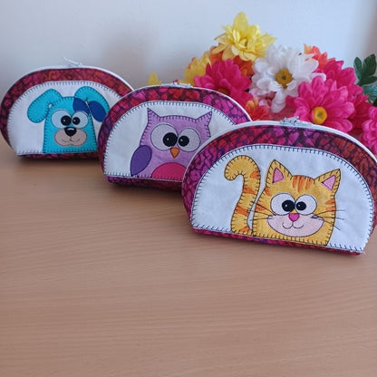 EW513 - ITH Quilted Crazy Eyes Character Pouches