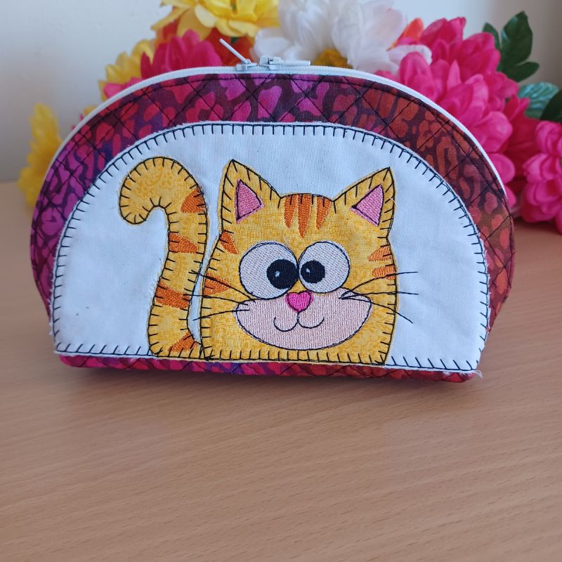 EW513 - ITH Quilted Crazy Eyes Character Pouches