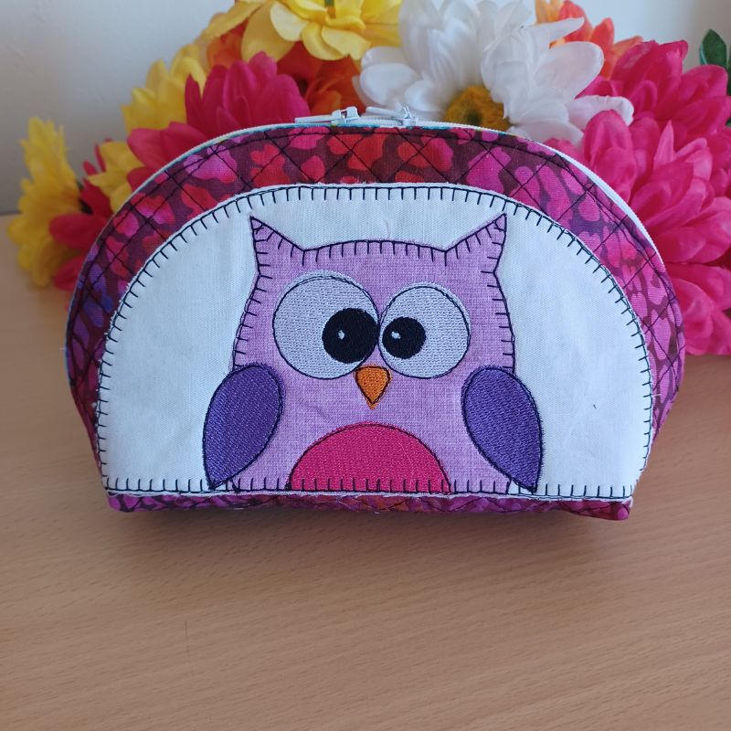 EW513 - ITH Quilted Crazy Eyes Character Pouches