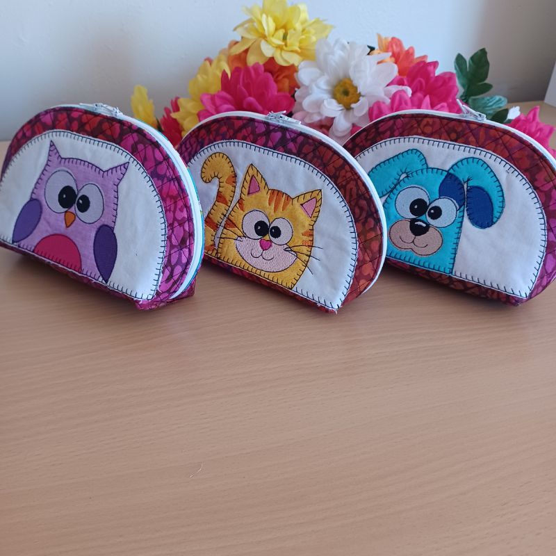 EW513 - ITH Quilted Crazy Eyes Character Pouches