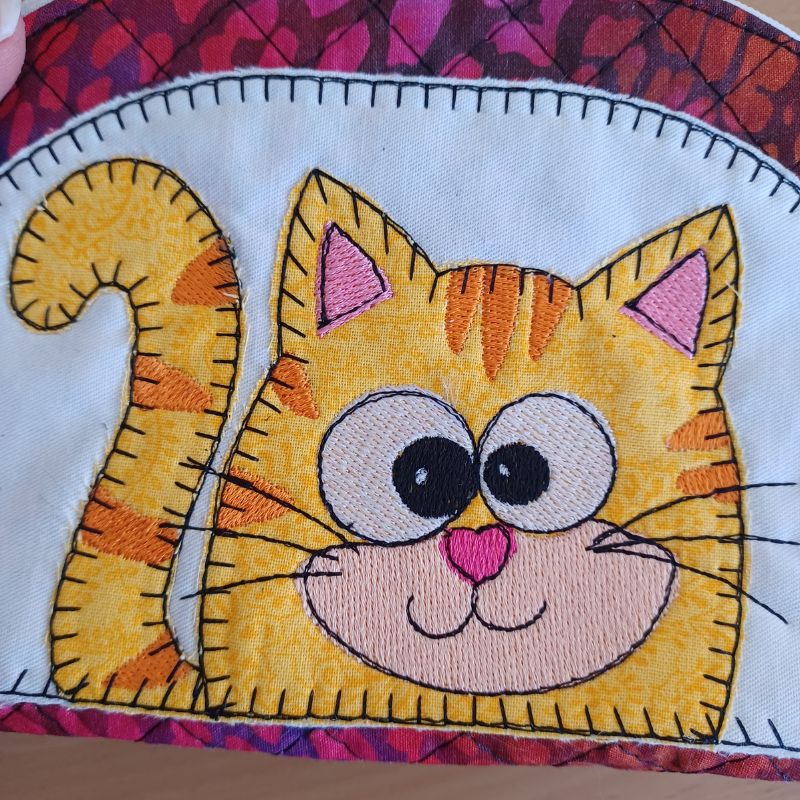 EW513 - ITH Quilted Crazy Eyes Character Pouches
