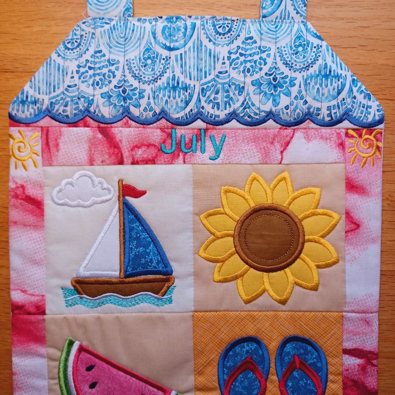 EW517 - ITH Mini House Quilt Collectable - July