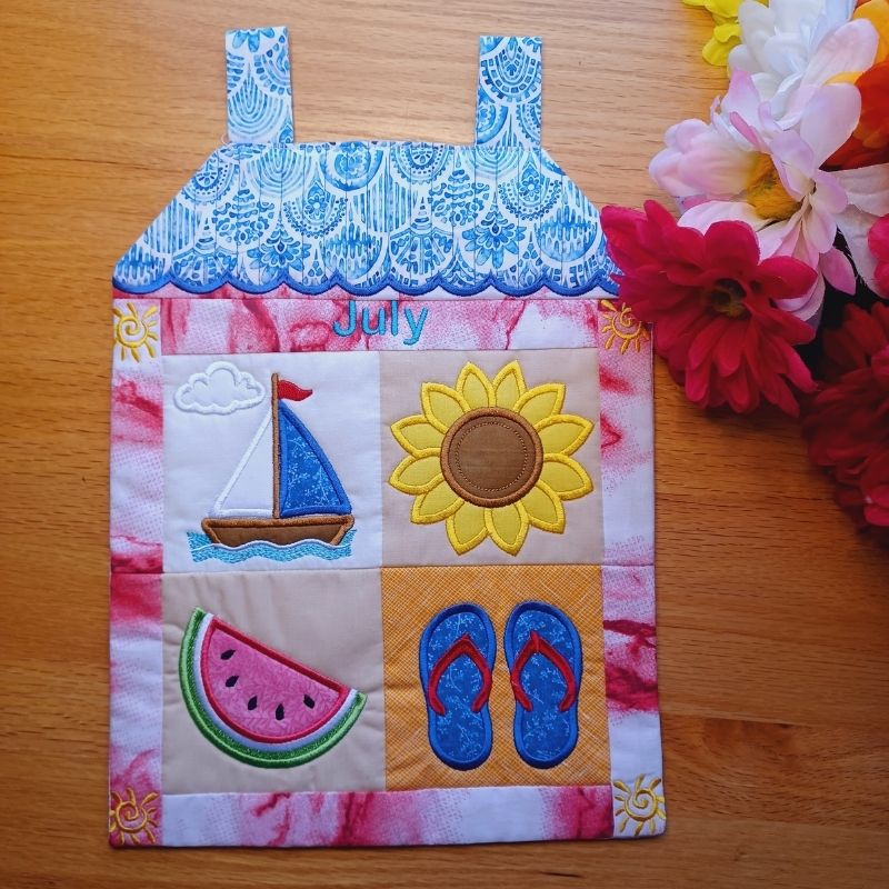 EW517 - ITH Mini House Quilt Collectable - July