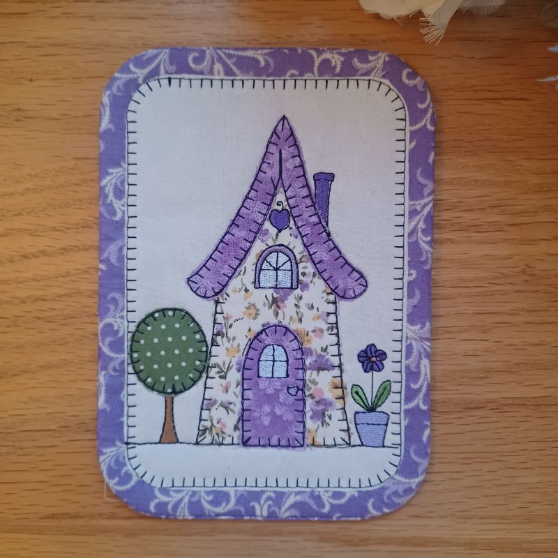 EW521 - ITH Country Cottages Applique Mug Rugs