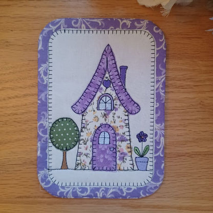 EW521 - ITH Country Cottages Applique Mug Rugs
