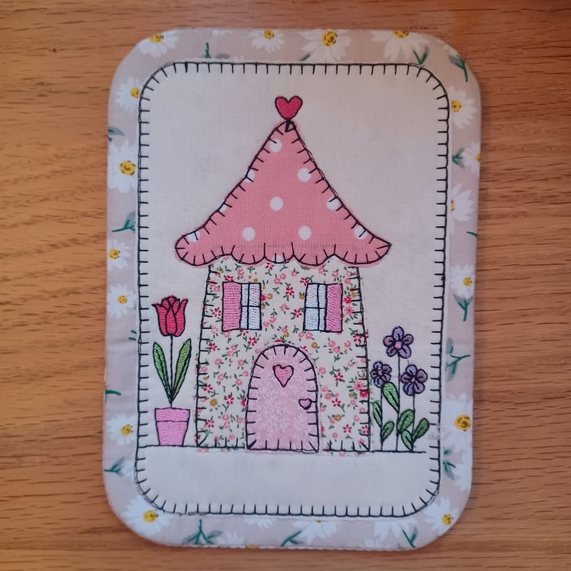 EW521 - ITH Country Cottages Applique Mug Rugs