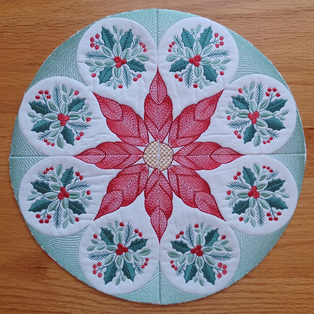 EW548 - Christmas Poinsettia Star Table Topper