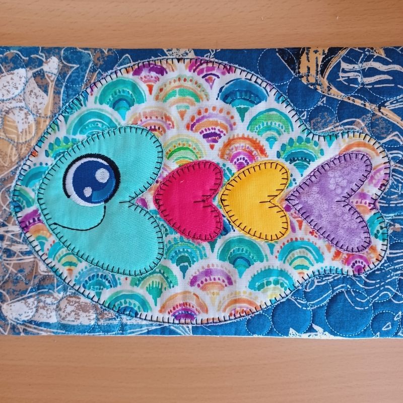 EWC282 - ITH Cute Applique Fish Placemat