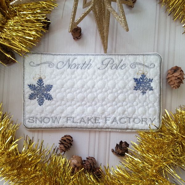 EWV177  ITH North Pole Mug Rugs