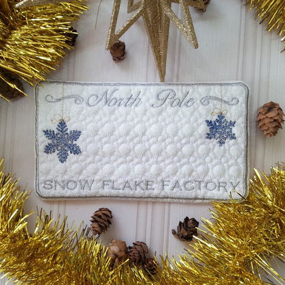 EWV177  ITH North Pole Mug Rugs