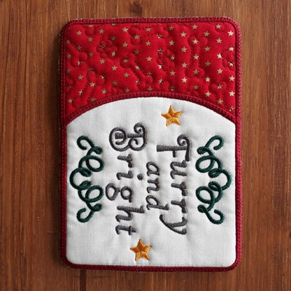 EWV292  ITH Woofmas Mug Rugs