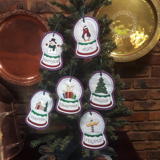 EWV293  Family Snow Globes